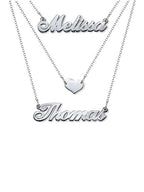 Two silver name necklaces with 'Melissa' and 'Thomas' on a white background